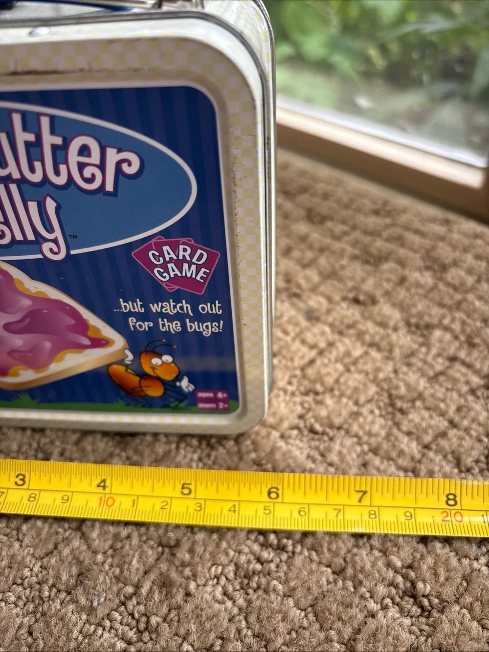Peanut Butter & Jelly Card Game Tin - closes well but missing closure on case